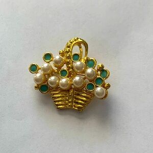 Vintage flower basket brooch featuring faux pearls and blue enamel flowers